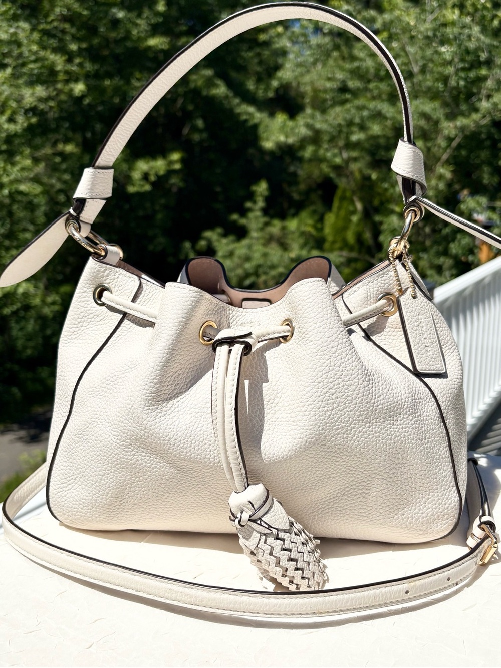 COACH Coach Everly Drawstring Shoulder Bag In Chalk White C5671